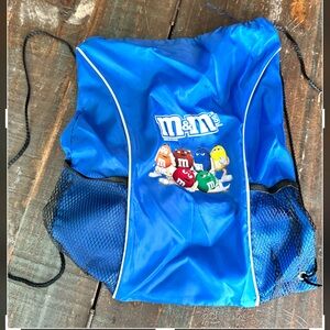 Super cute M&M light weight mini back pack.Great for sports or beach.